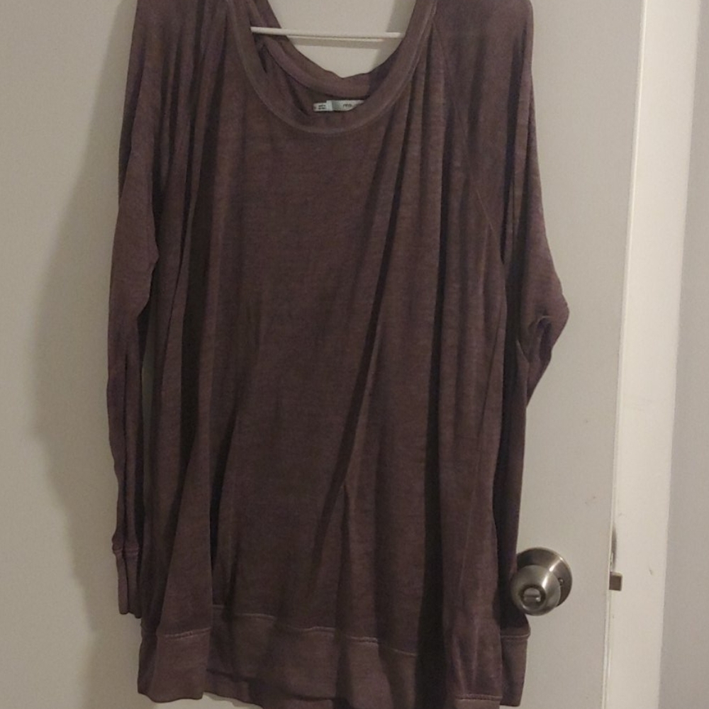 Woman's baggy sweatshirt.